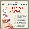 Zig-Zag - Slow Burning Rolling Papers with 32 Tips, Carton of 24 Packs, 32 Papers per Pack, Size King Slim, Easy Rolling, 100% Natural Gum Arabic, No Bleach, Authentic White Paper
